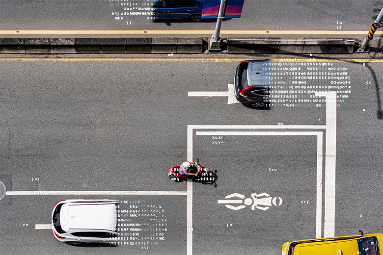 Aerial view of urban traffic with AI data overlays illustrating how AI is reshaping transportation, logistics, and defense competitiveness.