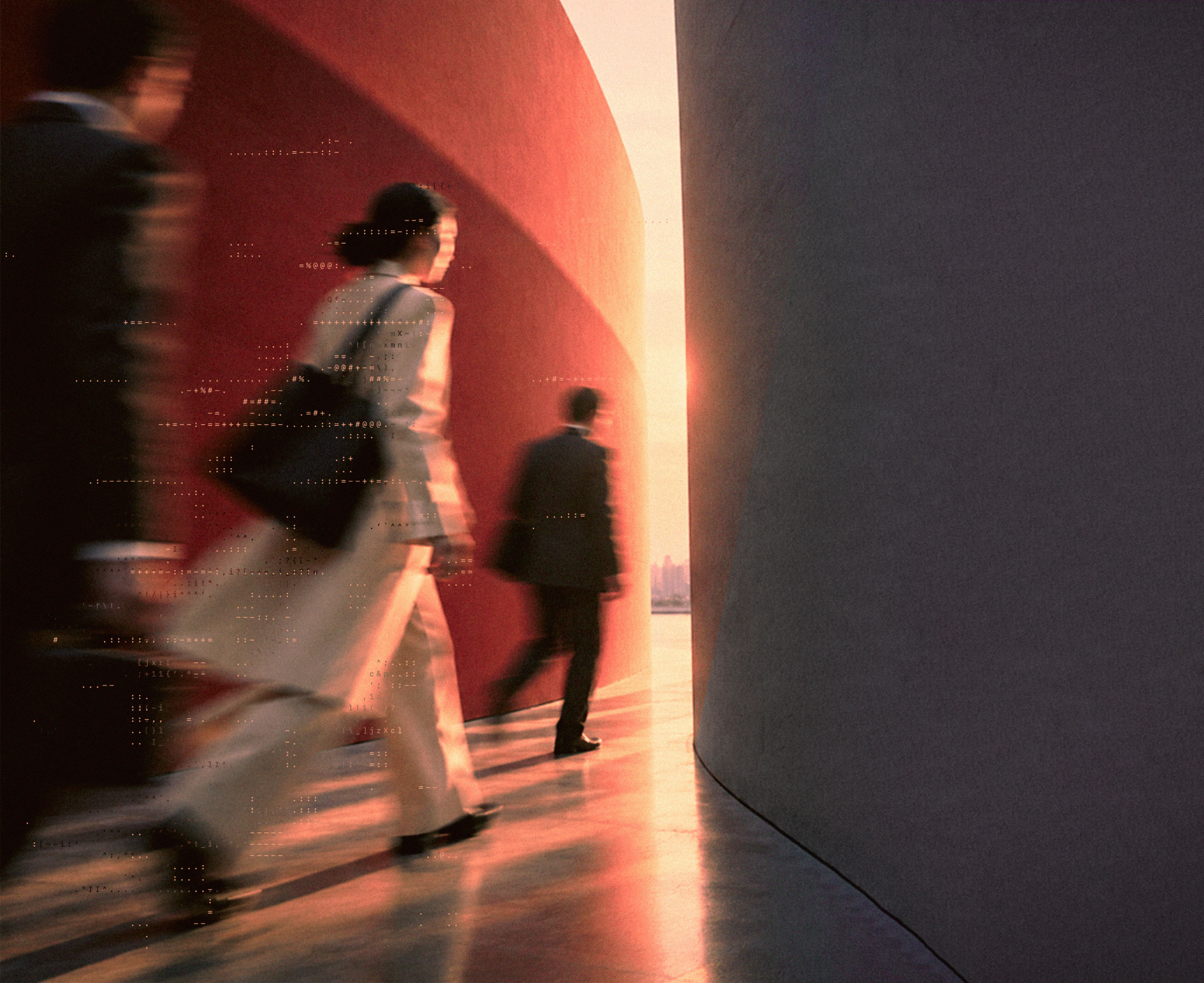 Businesspeople moving through a curved architectural space in warm light