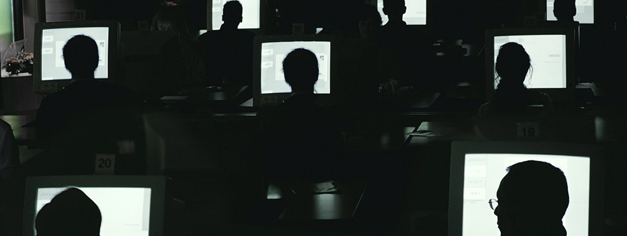 Photo by David Trood.
Picture number DT1808.
Date: 18.06.2003
People working in dark room on computers.