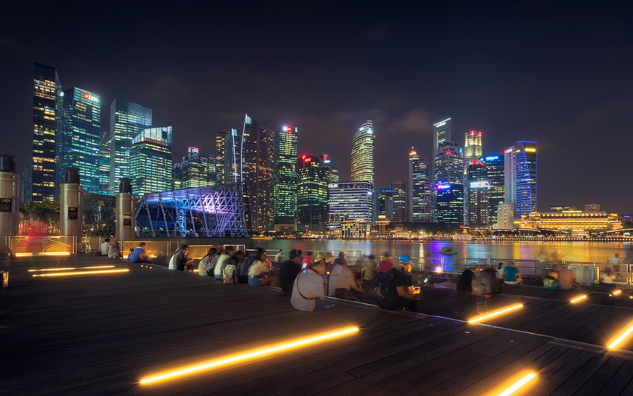 Cityscape of Singapore city skyline at night in Marina Bay